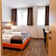 Orange Hotel und Apartments