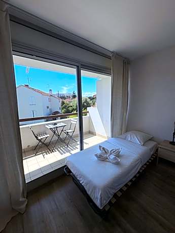 Quadruple Room with Balcony