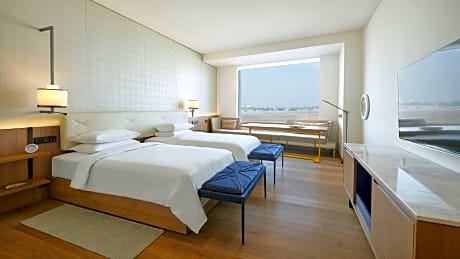 2 Twin Beds with Runway View