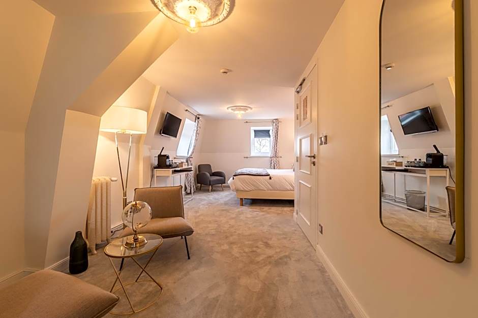 Hôtel Échappée en Baie - Parking privé gratuit dont forfaits bornes électriques réservable