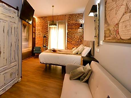 balcón MP-Cuádruple-Superior-Baño privado-Vista a la Ciudad