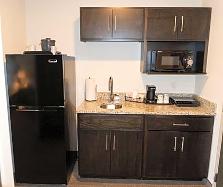 Suite-2 Queen Beds  Non-Smoking Flat Screen Television Kitchenette Microwave And Refrigerator Chair 
