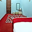 Capital O 90664 Rabi Hotel