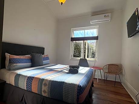 Queen Room with Shared Bathroom