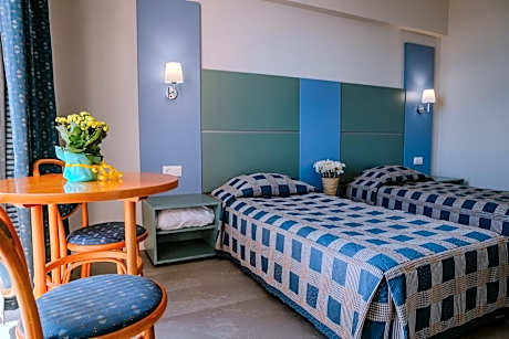 One-Bedroom Apartment (2 Adults + 2 Children)