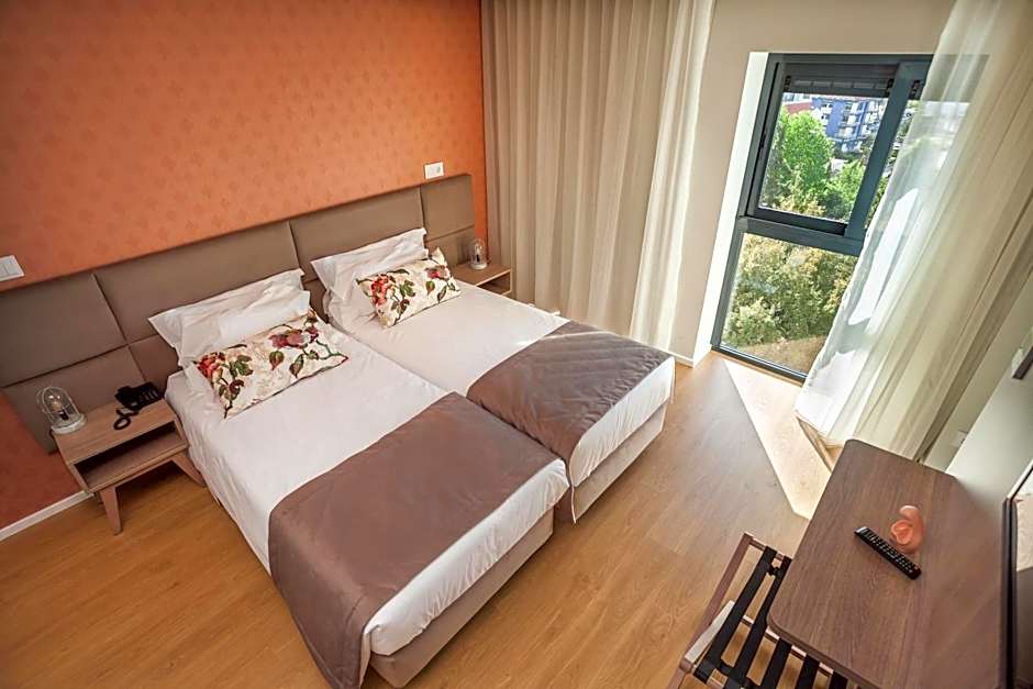 Essence Inn Marianos Hotel