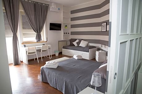 Quadruple Room with Shared Bathroom