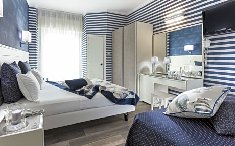 Deluxe Quadruple Room with Balcony