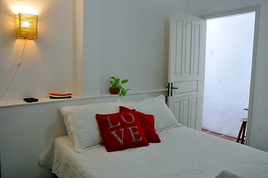 Suítes Recanto cama e café