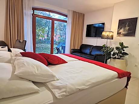 Two-Bedroom Apartment with Patio and Castle View