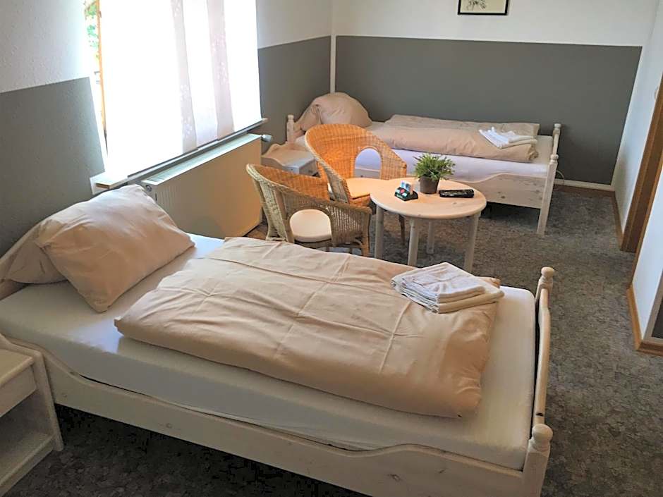 Photo 1 of 7 of Triple Room with Private Bathroom