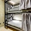 Cozy Bed in mixed room