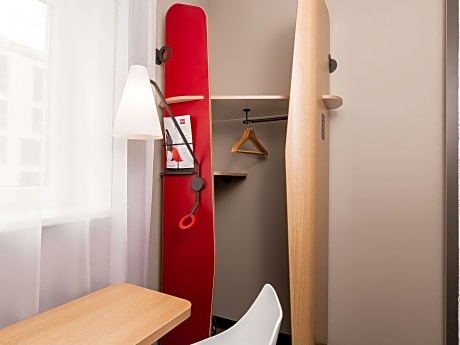 Room with one big bed and sofa