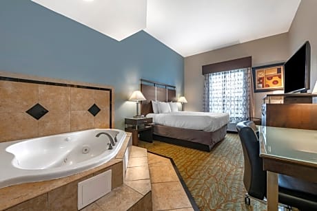 suite-1 king bed - non-smoking, whirlpool, high speed internet access, microwave and refrigerator, coffee maker, iron and ironing board, full breakfast