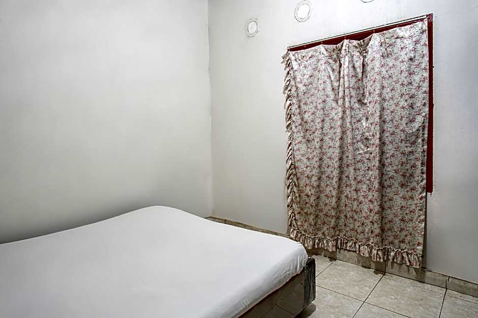 Hotel O Penginapan Tulimario Syariah