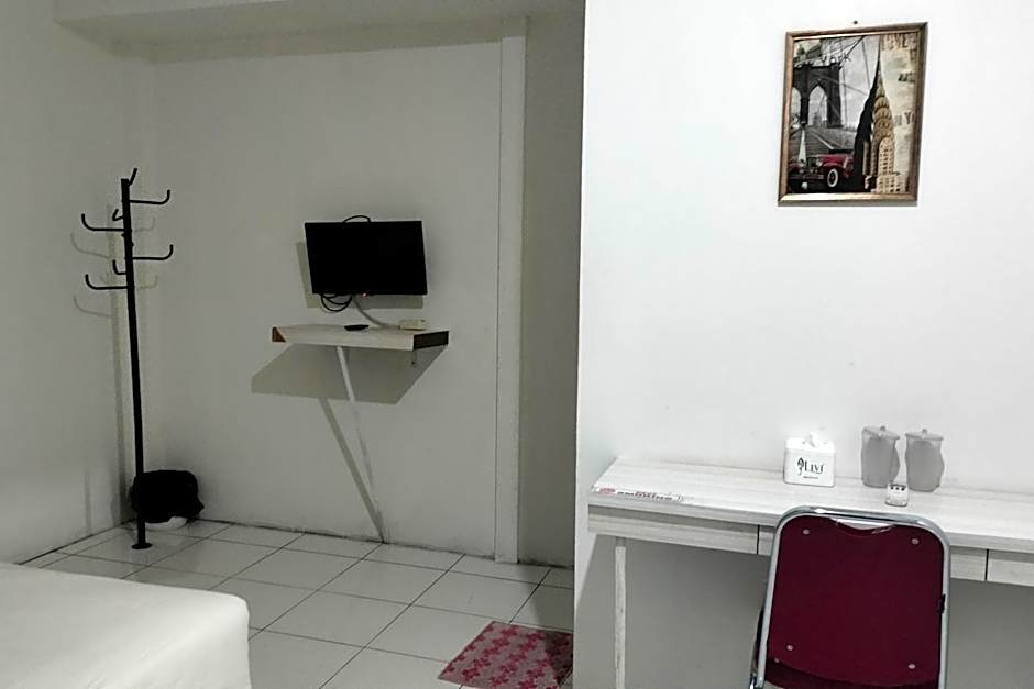 Cozy Home 2 Manado RedPartner – Manado, CA
