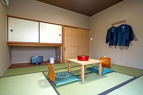 Quadruple Room with Shared Bathroom