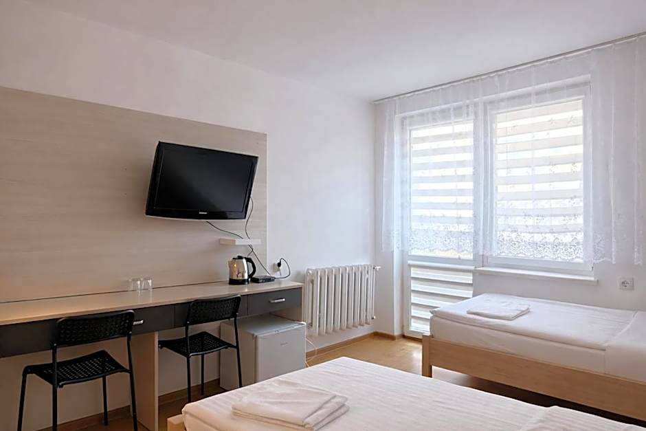 Photo 1 of 2 of Triple Room with Shared Bathroom