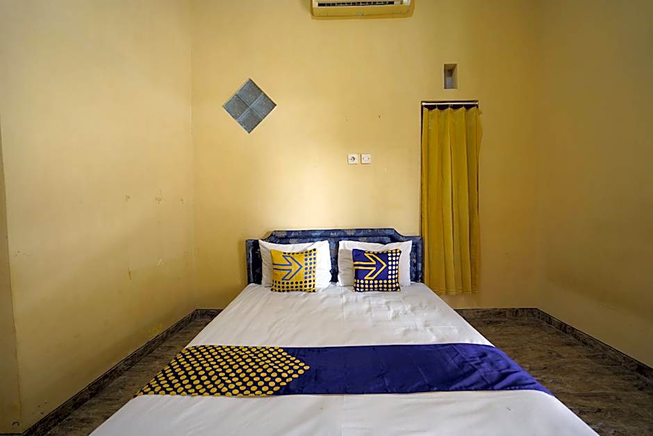 SPOT ON 92480 Iwn Homestay Syariah