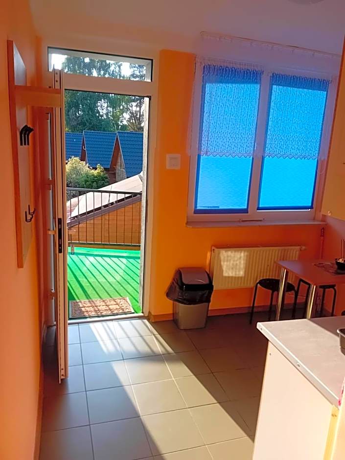 Domki i pokoje ,,Pod Palmami" w centrum