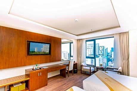 Family Deluxe Room with One Queen & One Double Bed and City View