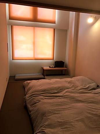 Quadruple Room with Shared Bathroom