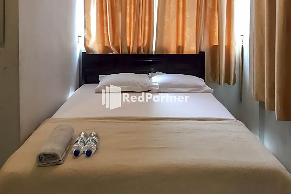 Aquino Marito Homestay Mitra RedDoorz