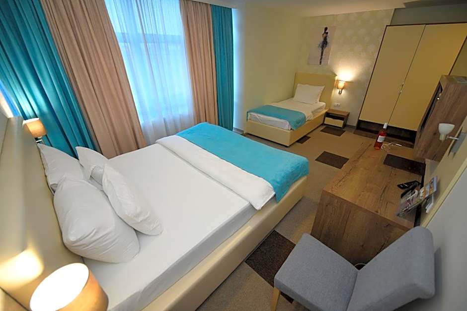Photo 1 of 4 of Triple Room