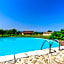 Lofts with private outdoor area and swimming-pool in Badesi