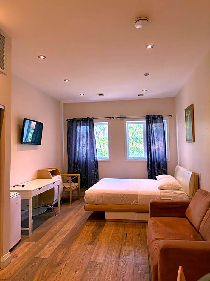 Photo 1 sur 6 de Deluxe 1 King Bed Suite