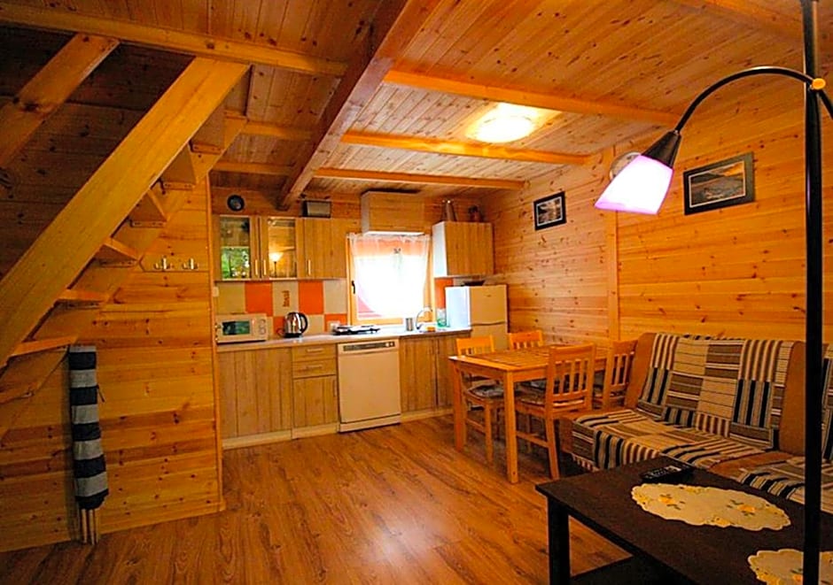 Sztil - Apartamenty i drewniane domki