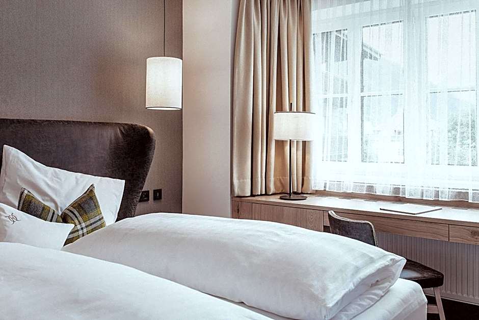 Österreichischer Hof-im Bademantel direkt in die Alpentherme