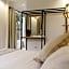 Sea Green Boutique Rooms