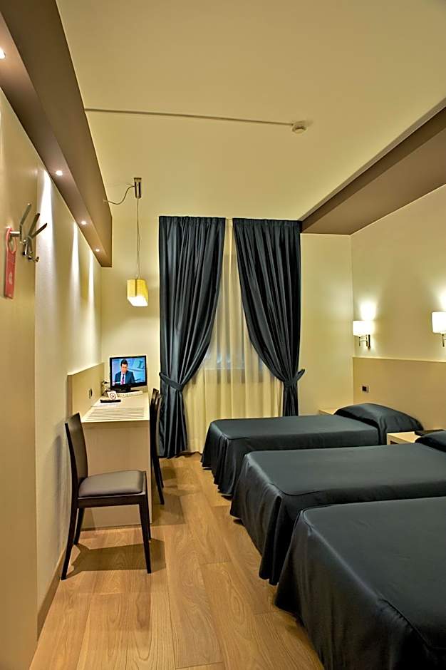 Photo 1 sur 7 de Triple Room