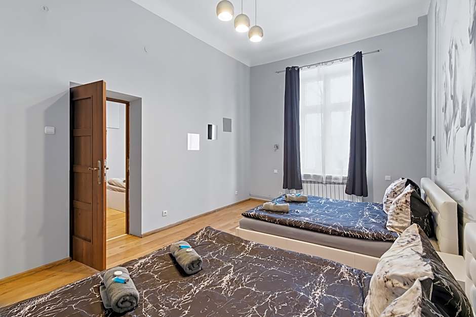 Queen Apartments