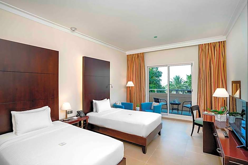 Photo 1 of 9 of Deluxe 2 Beds, Pool View