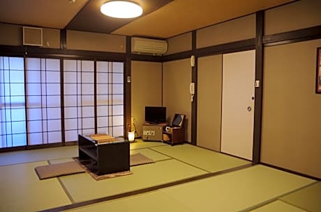 Japanese-Style Family Room with Shared Bathroom
