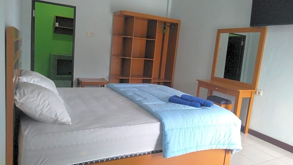 Hotel O Losmen Arkansas Syariah