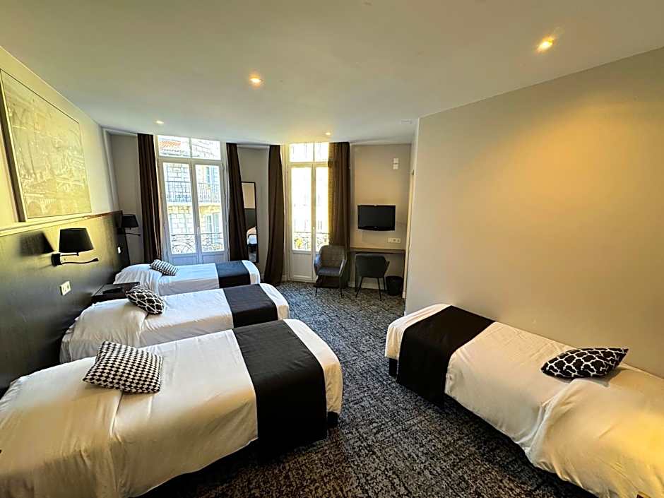 Photo 1 sur 4 de Quadruple Room