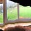 Shepherds Huts Ham Hill, 2 double beds, Bathroom, Lounge, Diner, Kitchen, dog friendly, Looking out to lake