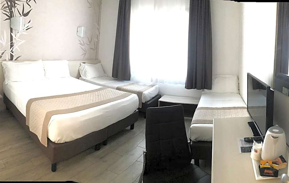 Photo 1 of 3 of Quadruple Room