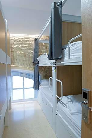 Bed in 8-Bed Female Dormitory Room