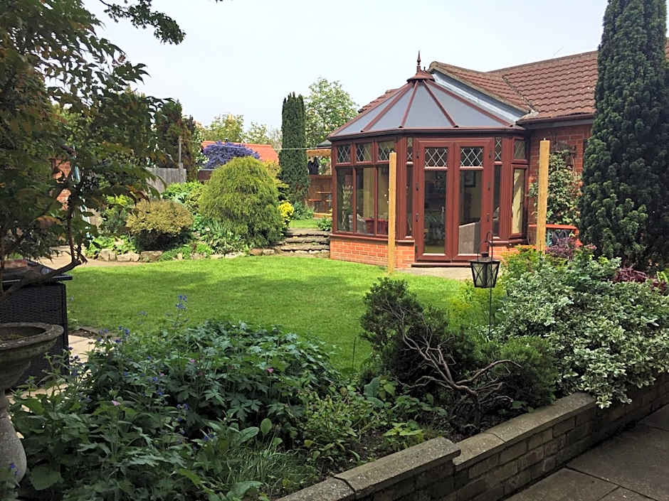 Toothbrush Rooms at Lattice Lodge - Guest Kitchen & EV Recharging