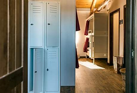 Single Bed in Dormitory Room