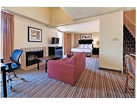 Loft Suite with One King and One Queen Bed - Smoking