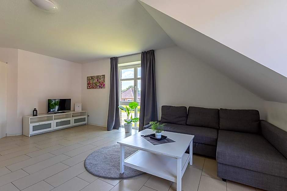 Natura Ferienhaus, Ferienwohnungen in Rhauderfehn , Komfort für Gäste & Firmen ,WLAN & Parkplatz