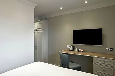 Compact Solo Small Room with One Double Bed