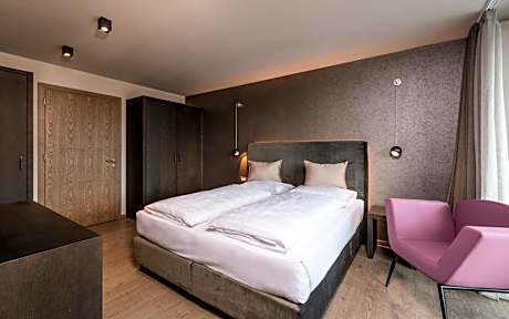 Single Room with East Balcony (Street side)