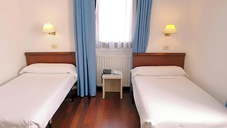 Double or Twin Room with Extra Bed (2 Adults + 1 Child)