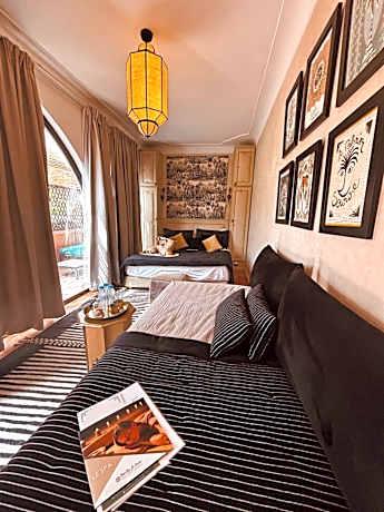 Deluxe Room (2 Adults + 1 Child)